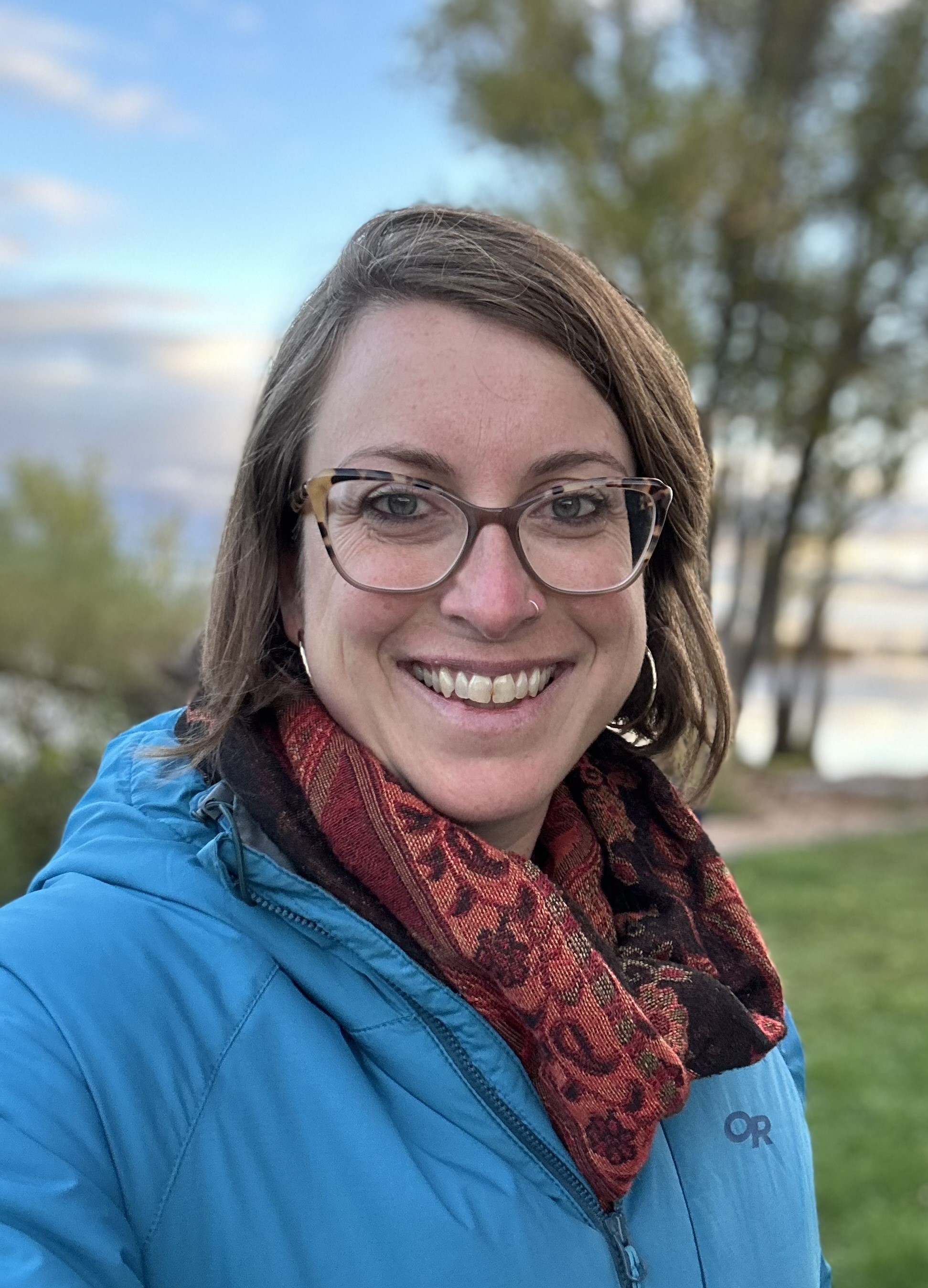 Woman in front of tree